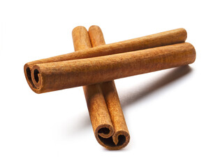 Delicious cinnamon sticks, isolated on white background