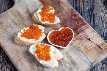 natural red salmon caviar with baguette and butter