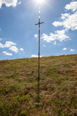 Fototapeta na wymiar religious catholic metal cross in nature