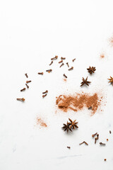 Light surface with cinnamon powder and anise stars