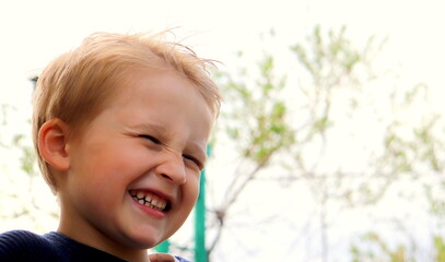 portrait of a blond boy of European appearance of Ukrainian nationality close-up selective focus.