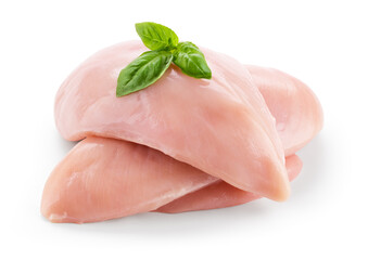 Chicken breast isolated. Raw chicken fillet on white background. Poultry raw with basil leaves. Chicken meat with clipping path. 