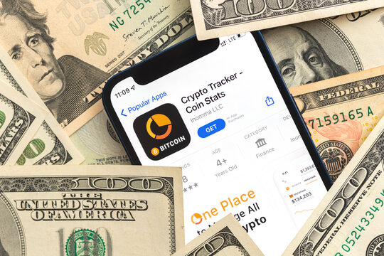 Crypto Tracker app, crypto currency application for mobile phone. Business and investment concept photo