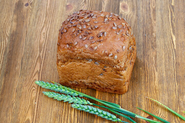a loaf of bread made of wheat flour and sunflower seeds
