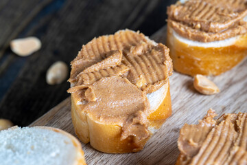 nut food on a cutting wooden board in the kitchen