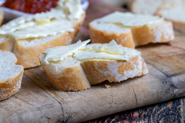 red salmon or trout caviar with white baguette and butter