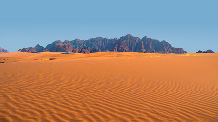 Panoramic view of orange sand dune desert with clear blue sky at Namib desert - Namibia