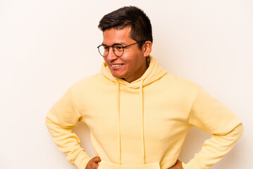 Fototapeta premium Young hispanic man isolated on white background happy, smiling and cheerful.