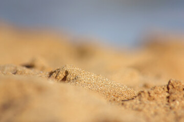 Summer vacation adventure and vacation travel freedom concept. Abstract blur blurred background, nature of tropical summer beach. Soft and blurry tropical beach. Golden sand beach. Summer outdoor vaca