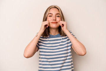 Young caucasian woman isolated on white background doubting between two options.