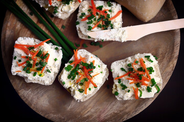 Canape with cream cheese and green onions. Healthy sandwich.