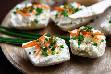 Canape with cream cheese and green onions. Healthy sandwich.