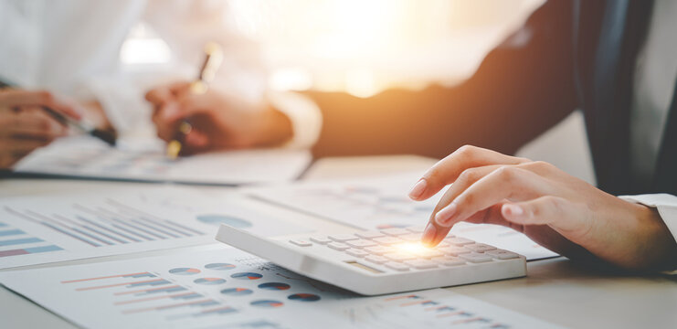 The financiers are calculating personal taxes for their customers..