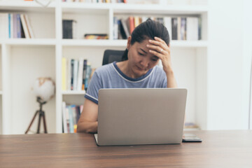 sad depression serious people from work,study stress problem.asian woman feeling tired suffering using computer working work place.concept global economic,health problems