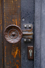 close-up of empty keyhole, door lock at the entrance, the texture is dark, black, empty background for text, images for designer, concept of Surveillance, locking systems