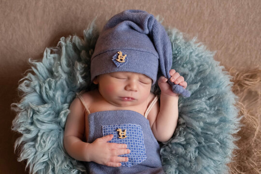 beautiful newborn baby sleeps in a