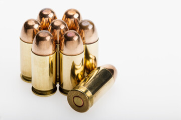 11 mm. or .45 gun bullets , Full metal jacket ammunition on white background