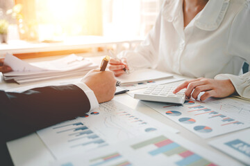 The financiers are calculating personal taxes for their customers..