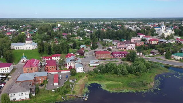 Aerial panoramic view of Russian town of Myshkin on banks of Volga River on summer day overlooking Assumption Cathedral and Nikolskaya church, Yaroslavl Oblast