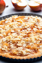 still life of fruit cake with almonds