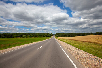 Fototapeta na wymiar paved highway in the countryside