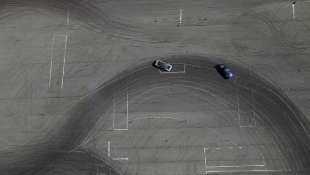 Top View. Two Cars Drive Close In Drift. Track Day.