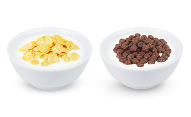 Chocolate corn flakes and vanilla corn flakes in milk on an isolated white background. Chocolate corn flakes and vanilla corn flakes in mill in white bowl.