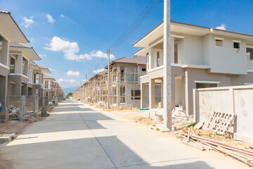 Fototapeta na wymiar construction residential new house in progress at building site housing estate development