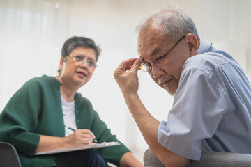 Psychology, depression people. Elderly asian adult man, men consulting with psychologist...