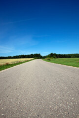 wheel ruts like a highway with a blue sky