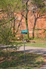 Red Rock Canyon Road and Group Camp Road sign in Red Rock Canyon State Park (SP) in the State of Oklahoma, USA