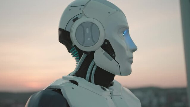 Automated AI white professional robotic cyborg observing modern cityscape views from rooftop. Progressive technology. Future is now.
