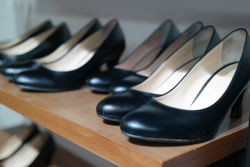 Black women's shoes neatly displayed