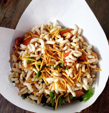 Bhel poori, an Indian road side snack in a conical shape paper container