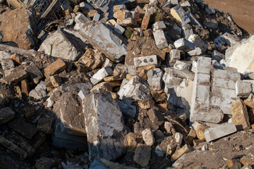 Fototapeta na wymiar bricks and other building materials scattered on the territory