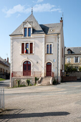 Fototapeta na wymiar Village hall of La Chapelaude with the French and Ukrainian flags, Allier, France