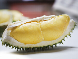 Durian fruit with sharp bark Flesh, sweet yellow color on the table