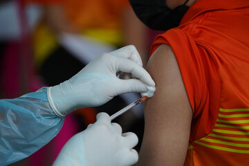 Doctors vaccinate to immunize against COVID-19 to the people and to prevent the outbreak of influenza or COVID-19