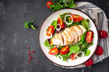 salad chicken meat vegetable tomato, chicken breast, green mix leaves lettuce meal food snack on the table copy space food background 