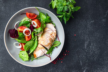 salad chicken meat vegetable tomato, chicken breast, green mix leaves lettuce meal food snack on the table copy space food background 