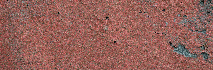 grunge texture of building wall covered by aged and weathered roofing material, panoramic web banner