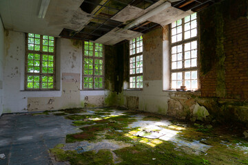 Abandonned cloister with decayed rooms and halls in Valkenburg The Netherlands