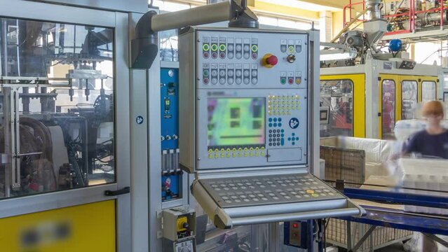 A factory for plastic canister production timelapse hyperlapse. The conveyor in the factory.