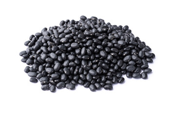 A pile of raw black beans isolated over white background