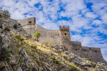 Fototapeta na wymiar Montenegro. Bay of Kotor, Gulf of Kotor, Boka Kotorska and walled old city. Fortifications of Kotor is on UNESCO World Heritage List since 1979