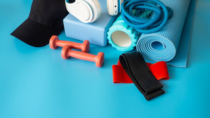 Sports equipment for fitness. Fitness and healthy lifestyle. Blue background. - obrazy, fototapety, plakaty