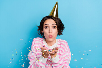 Portrait of pretty sweet positive girl have fun on birthday event party blow you confetti isolated...