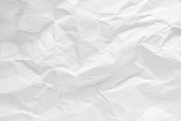 White crumpled paper texture background.