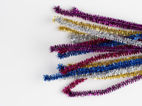 Rainbow Sparkly Pipe Cleaners On A White Background