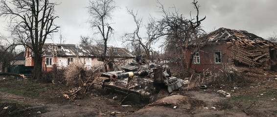 War in Ukraine. Destroyed Ukrainian tank in Chernihiv region - obrazy, fototapety, plakaty